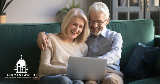 older couple sitting on a couch